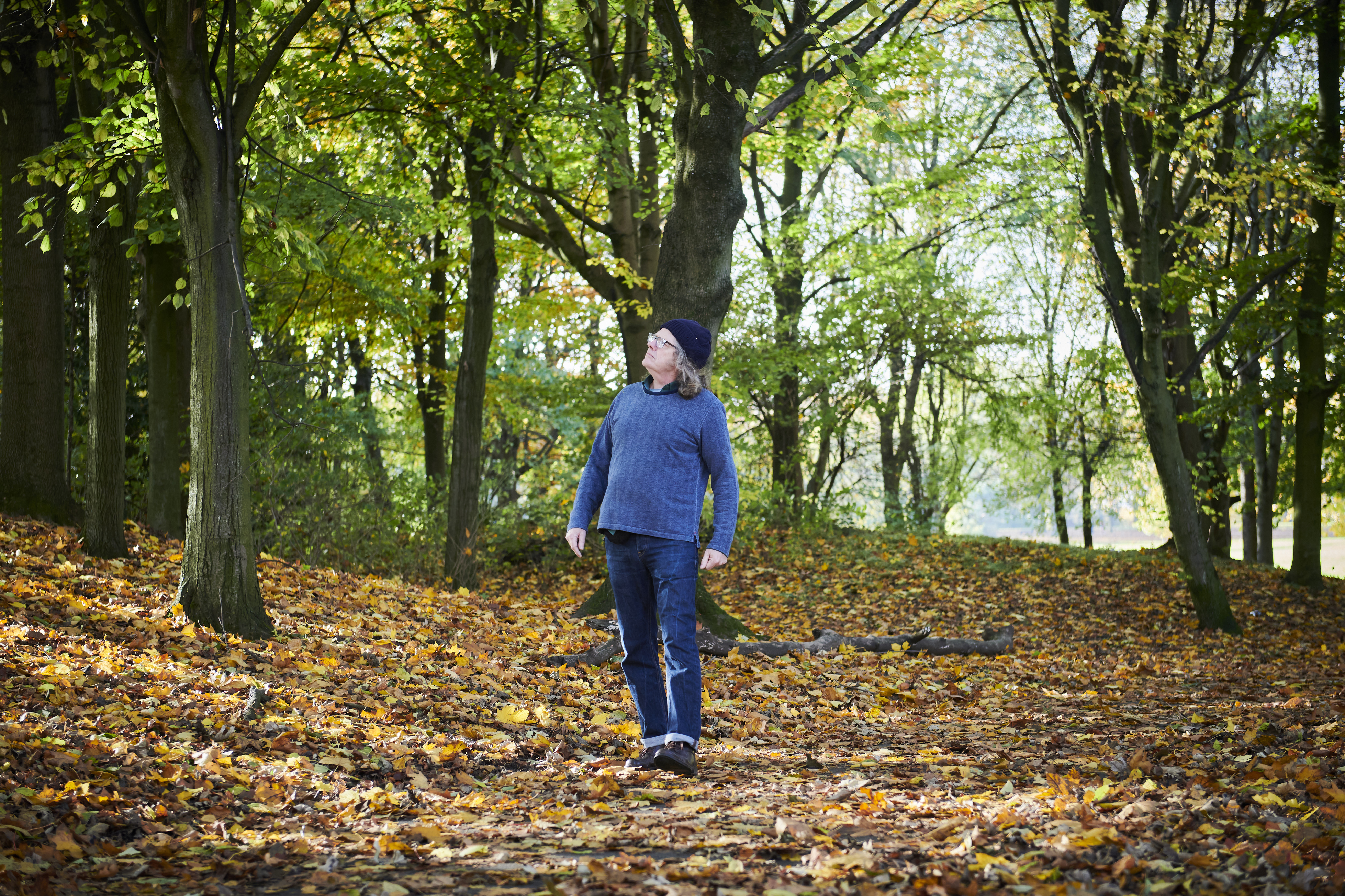 Kev walking through woods